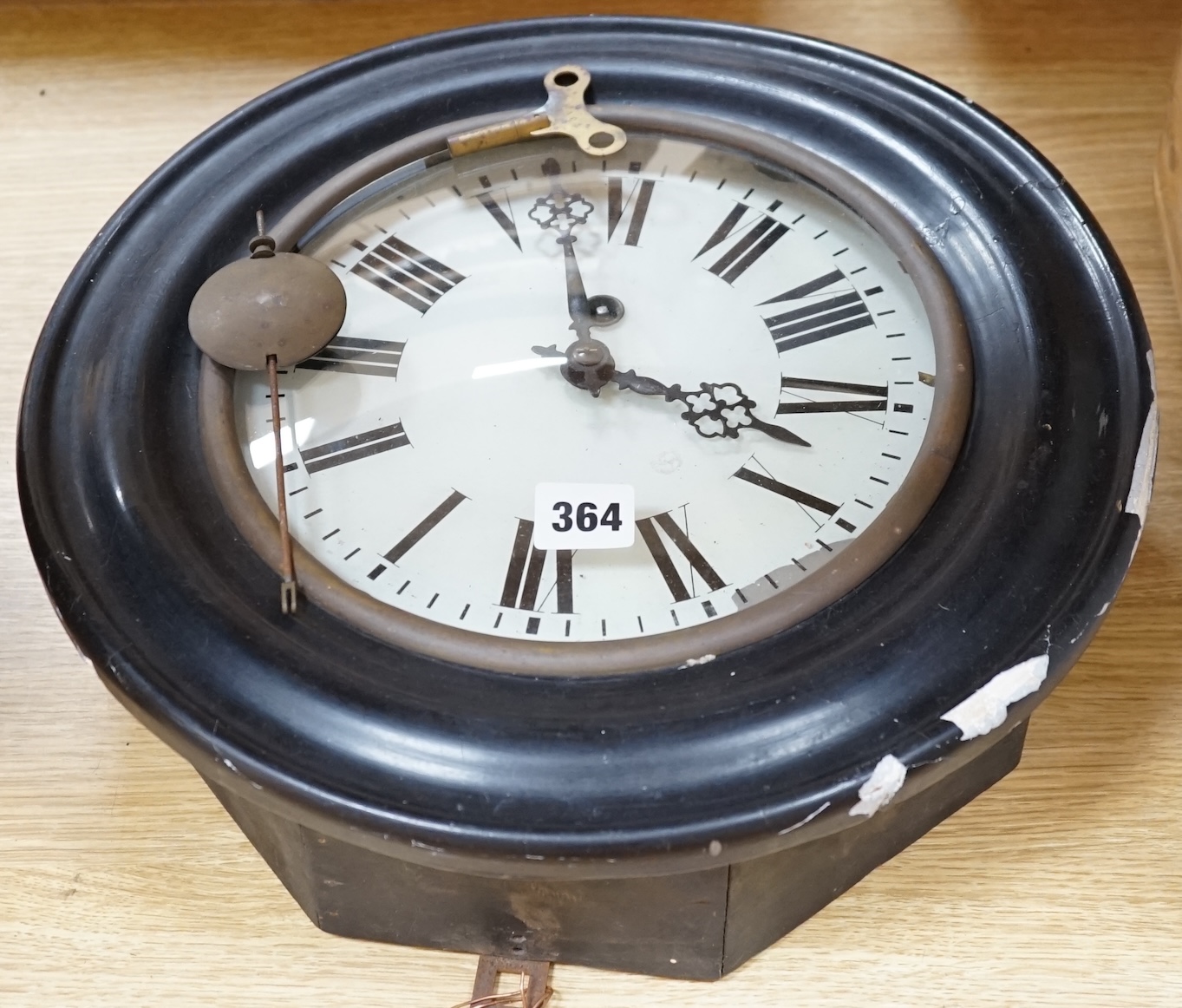 A late 19th century circular wall timepiece, dial 24.5cm. Condition - poor